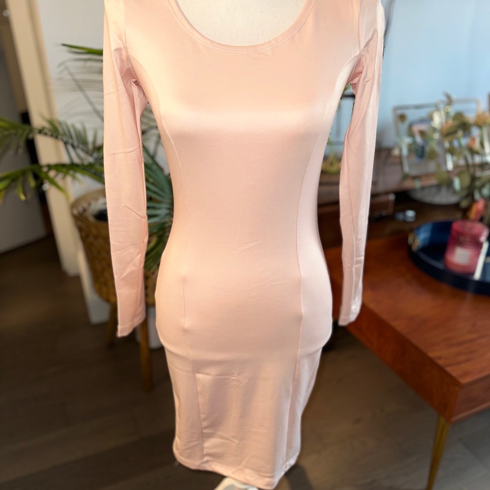 Blush pink mini dress with cut out back design